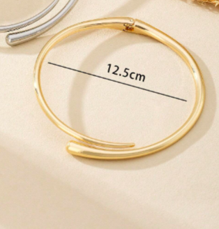 GOLDEN ARC SET NECKLACE + BRACELET